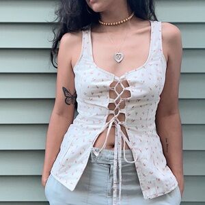 Beige and pink floral tank top with lace up front 
Size M Handmade